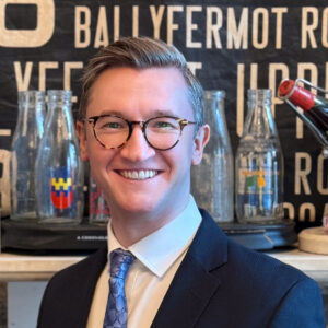 A photo of a smiling Daryl Hendley Rooney in the Little Museum